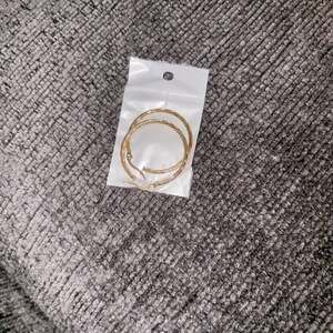 Twisted Gold Tone Hoop Earrings